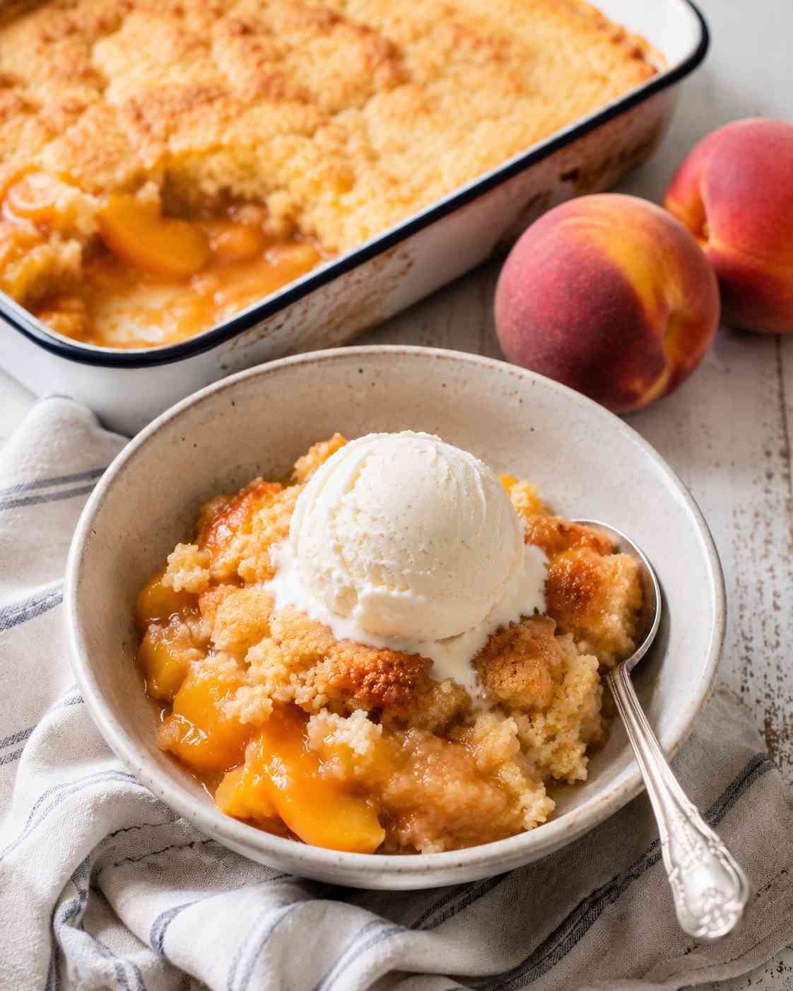 grandmas Peach cobbler with vanilla ice cream