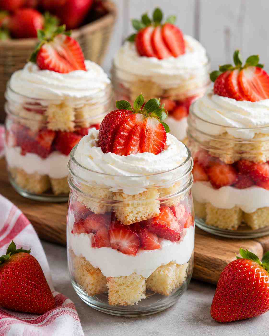 Layered strawberry shortcake parfaits